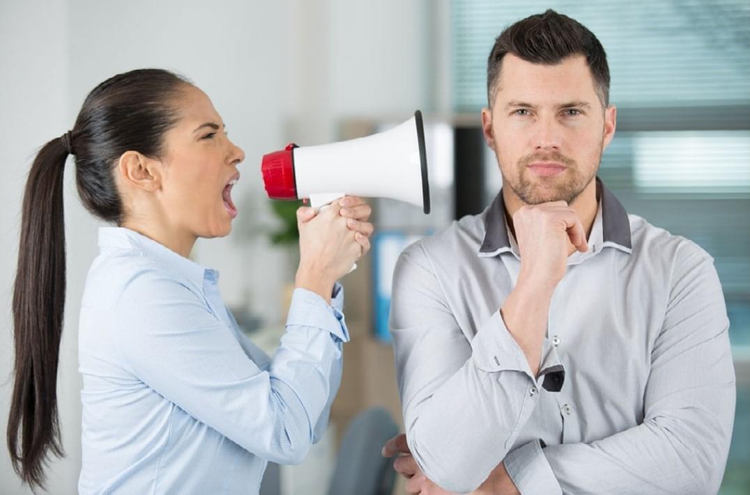 Man ignoring negative words using from a woman