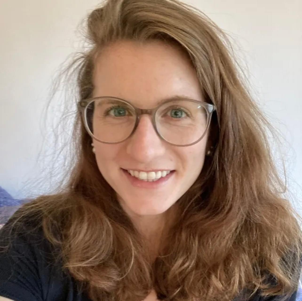 Woman smiling because she effectively treated her social anxiety