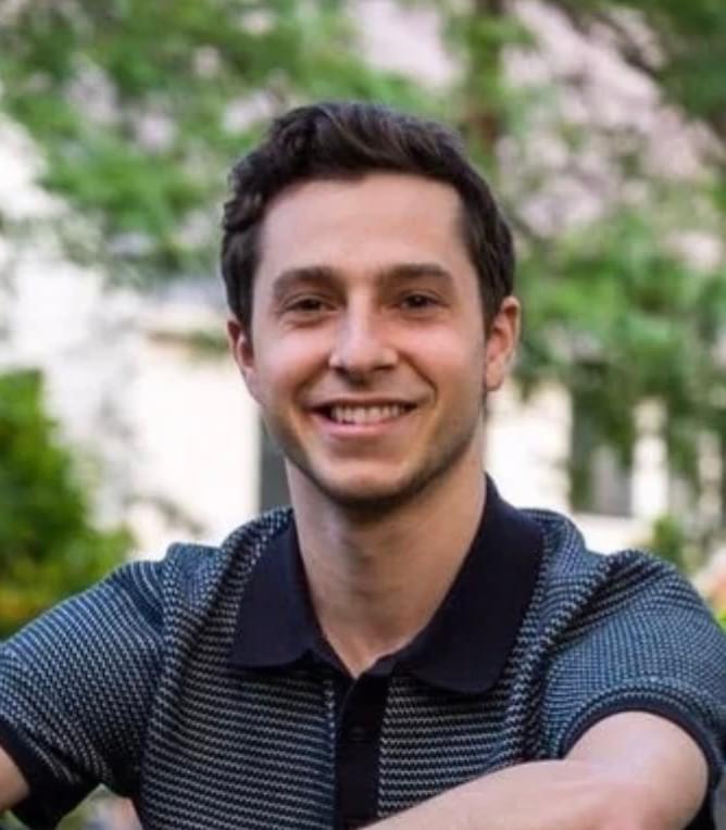 Man smiling because he was successfully treated for social anxiety